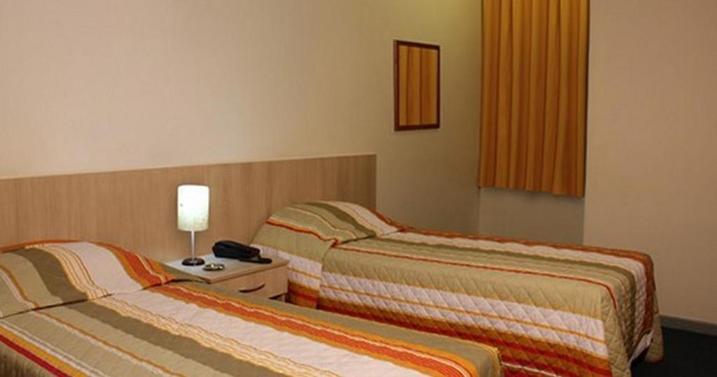 Euro Hotel Curitiba Habitación foto